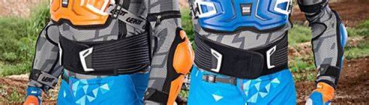 Why do dirt bike riders wear kidney belts?